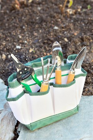 simsearch:400-08961753,k - Detail of gardening tools in tool bag - outdoor Fotografie stock - Microstock e Abbonamento, Codice: 400-04317357
