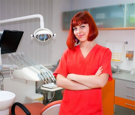 simsearch:400-04340930,k - Image of young lady with dentist over her checking oral cavity Foto de stock - Super Valor sin royalties y Suscripción, Código: 400-04317466