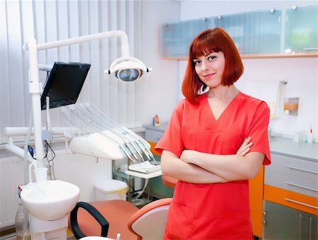 simsearch:400-04309650,k - Image of young lady with dentist over her checking oral cavity Stock Photo - Budget Royalty-Free & Subscription, Code: 400-04317467
