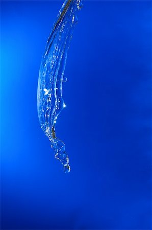 simsearch:400-04583692,k - beautiful water splash on blue gradient background Photographie de stock - Aubaine LD & Abonnement, Code: 400-04317511