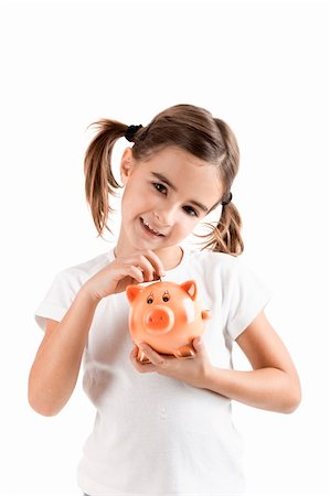 Little girl holding a piggy-bank and inserting a one euro coin Stock Photo - Budget Royalty-Free & Subscription, Code: 400-04317594