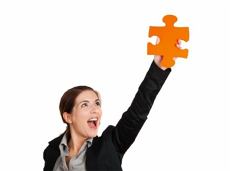 person holding up sign - Happy business woman holding a big piece of puzzle, isolated on white Stock Photo - Budget Royalty-Free & Subscription, Code: 400-04317616