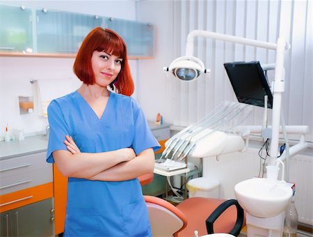 simsearch:400-08109752,k - Image of young lady with dentist over her checking oral cavity Stock Photo - Budget Royalty-Free & Subscription, Code: 400-04317817
