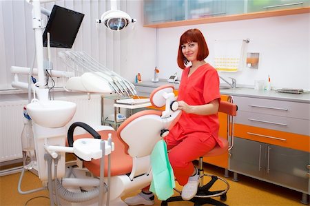 simsearch:400-04340930,k - Image of young lady with dentist over her checking oral cavity Foto de stock - Super Valor sin royalties y Suscripción, Código: 400-04317818