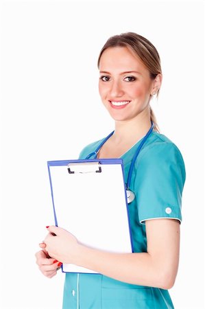 simsearch:400-04178933,k - Smiling female doctor holding a clipboard against white background. Stock Photo - Budget Royalty-Free & Subscription, Code: 400-04317951
