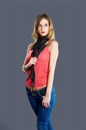simsearch:400-04163723,k - Young fashionable model with scarf at black background Stock Photo - Budget Royalty-Free & Subscription, Code: 400-04317969