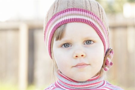 simsearch:400-04825533,k - Closeup photo of a cute toddler girl with a knit hat Stock Photo - Budget Royalty-Free & Subscription, Code: 400-04318311