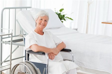 paraplegic women in wheelchairs - Senior woman in her wheelchair looking at the camera Stock Photo - Budget Royalty-Free & Subscription, Code: 400-04318713