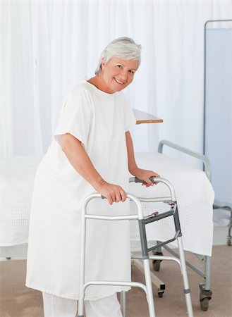 simsearch:400-06365837,k - Senior woman looking at the camera with her zimmer frame Stockbilder - Microstock & Abonnement, Bildnummer: 400-04318752