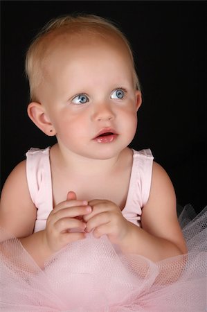 simsearch:400-07302639,k - Cute blond baby ballerina looking into the distance Stock Photo - Budget Royalty-Free & Subscription, Code: 400-04318860