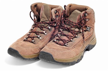 simsearch:862-03289029,k - a pair of hiking boots isolated on a white background Photographie de stock - Aubaine LD & Abonnement, Code: 400-04318990