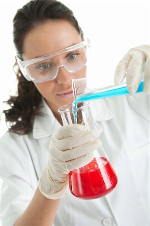 Woman involved in chemical research. Isolated on white Stock Photo - Budget Royalty-Free & Subscription, Code: 400-04319255