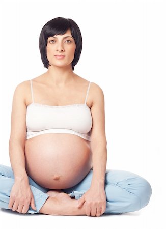 simsearch:400-06849973,k - Sitting pregnant woman isolated over white background Stock Photo - Budget Royalty-Free & Subscription, Code: 400-04319449
