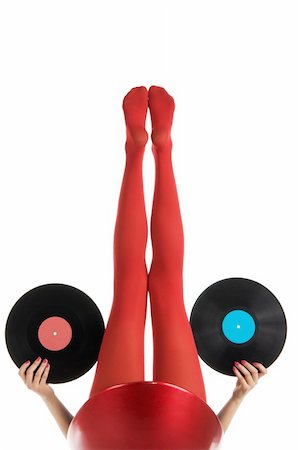 simsearch:400-04308604,k - Female feet in red stockings with vinyl record isolated in white Stock Photo - Budget Royalty-Free & Subscription, Code: 400-04319587