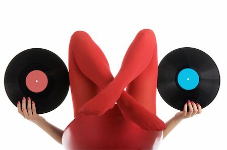 simsearch:400-04308604,k - Female feet in red stockings with vinyl record isolated in white Stock Photo - Budget Royalty-Free & Subscription, Code: 400-04319588