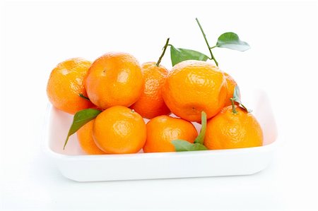 simsearch:400-04164071,k - Tangerines with leaves isolated over white Stock Photo - Budget Royalty-Free & Subscription, Code: 400-04319650