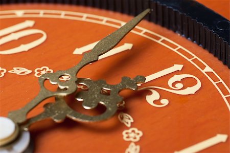 Closeup view of antique clock face. Last minutes before midnight. Stock Photo - Budget Royalty-Free & Subscription, Code: 400-04319824