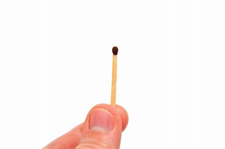 Hand holds the match on a white background Stock Photo - Budget Royalty-Free & Subscription, Code: 400-04310472