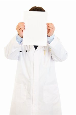 simsearch:400-05745246,k - Doctor holding empty white  paper in front of her face isolated on white Photographie de stock - Aubaine LD & Abonnement, Code: 400-04310642