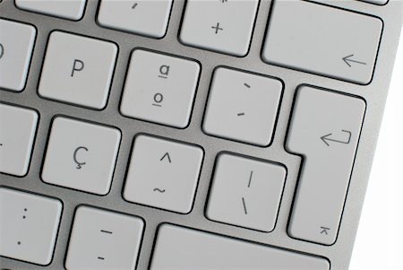 simsearch:400-04698351,k - Closeup of a modern aluminium keyboard, focus on the Return key. Stock Photo - Budget Royalty-Free & Subscription, Code: 400-04310729