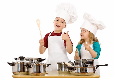 Happy satisfied chef and his aid - kids with cooking utensils, isolated Stock Photo - Budget Royalty-Free & Subscription, Code: 400-04310832