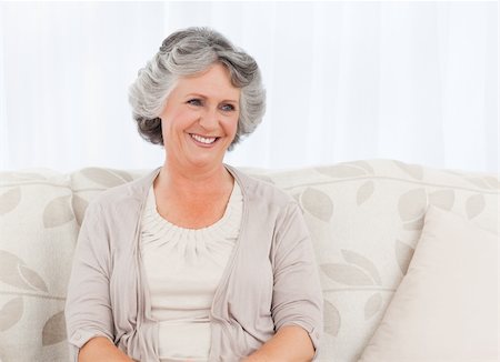 Smiling retired woman  at home Stock Photo - Budget Royalty-Free & Subscription, Code: 400-04310994