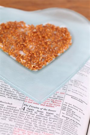 simsearch:400-04286012,k - Bible open to Mark 4 with focus on the Parable of the Sower and a heart shaped plate with cress sprouts Stock Photo - Budget Royalty-Free & Subscription, Code: 400-04311029