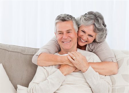 simsearch:400-04311095,k - Mature woman hugging her husband at home Stock Photo - Budget Royalty-Free & Subscription, Code: 400-04311031
