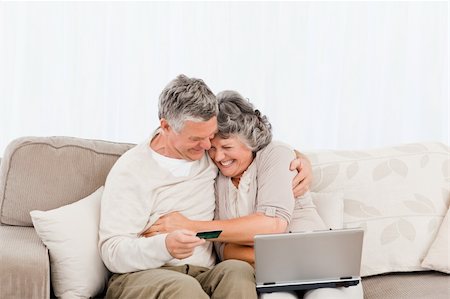 simsearch:400-04311095,k - Seniors buying something on internet at home Stock Photo - Budget Royalty-Free & Subscription, Code: 400-04311050