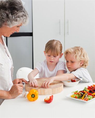 simsearch:400-04306457,k - Children cooking with their grandmother at home Stock Photo - Budget Royalty-Free & Subscription, Code: 400-04311169