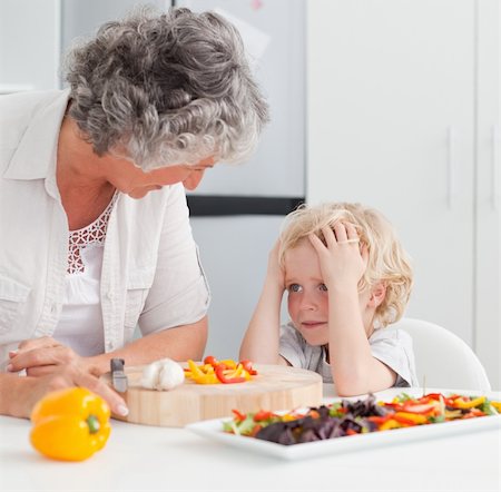simsearch:400-04813285,k - Little boy looking at his grandmother cooking at home Stock Photo - Budget Royalty-Free & Subscription, Code: 400-04311187