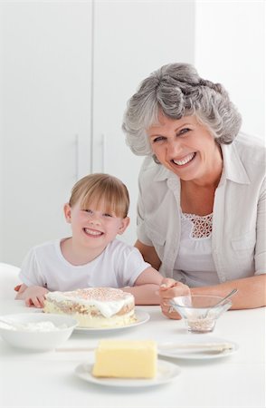simsearch:400-04306457,k - Lovely girl and her grandmother looking at the camera Stock Photo - Budget Royalty-Free & Subscription, Code: 400-04311194