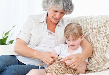 Grandmother helping her little girl to knit Stock Photo - Budget Royalty-Free & Subscription, Code: 400-04311205