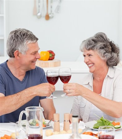 simsearch:400-05314664,k - Senior couple drinking some wine at home Stock Photo - Budget Royalty-Free & Subscription, Code: 400-04311238