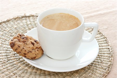 Close up view of two chocolate chip cookie on white saucer with expresso coffee Stock Photo - Budget Royalty-Free & Subscription, Code: 400-04311843