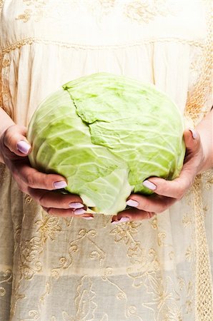 fuzzbones (artist) - Housewife holding  a piece of cabbage Stock Photo - Budget Royalty-Free & Subscription, Code: 400-04312169