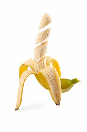 Pieces of banana floating in midair on white background Foto de stock - Super Valor sin royalties y Suscripción, Código: 400-04312231