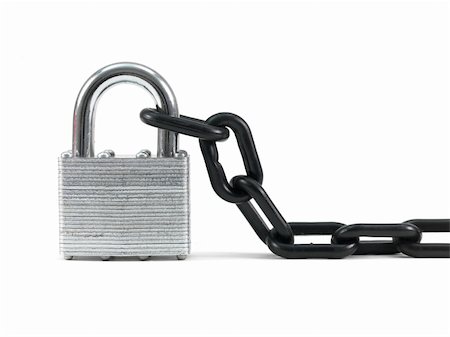 padlock and chain gate - A black chain and padlock isolated against a white background Stock Photo - Budget Royalty-Free & Subscription, Code: 400-04312396