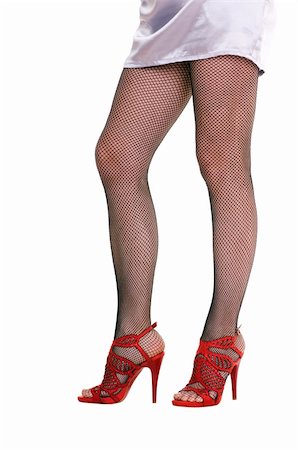 simsearch:400-04280211,k - female legs in black pantyhose isolated on white background Foto de stock - Super Valor sin royalties y Suscripción, Código: 400-04312597