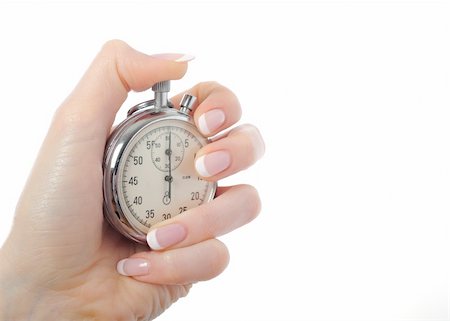 simsearch:400-08648450,k - Beautiful womans hand with stop watch. isolated on white background Foto de stock - Super Valor sin royalties y Suscripción, Código: 400-04312747