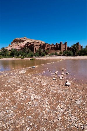 simsearch:400-04334146,k - Kasbah A?t Benhaddou, fortified city situated on a hill along the Ounila River, has been a UNESCO World Heritage Site since 1987. Best of Morocco. Stock Photo - Budget Royalty-Free & Subscription, Code: 400-04313255