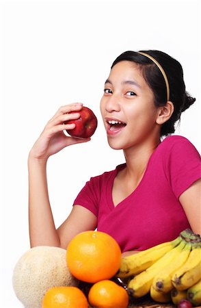 pretty women eating banana - image of young lady about to eat apple Photographie de stock - Aubaine LD & Abonnement, Code: 400-04313551