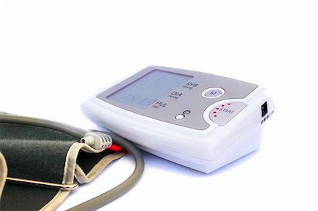 simsearch:400-04032666,k - Modern digital blood pressure measurement isolated on white background. Photographie de stock - Aubaine LD & Abonnement, Code: 400-04313792