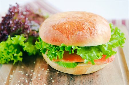 shivanetua (artist) - A big juicy burger ready to satiate your lunchtime appetite Fotografie stock - Microstock e Abbonamento, Codice: 400-04313827