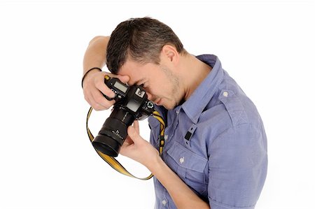 simsearch:400-04270950,k - professional male photographer taking picture . isolated on white background Stockbilder - Microstock & Abonnement, Bildnummer: 400-04313876