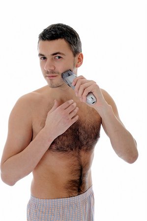 simsearch:400-04594366,k - Young handsome man shaving in the morning . isolated on white background Photographie de stock - Aubaine LD & Abonnement, Code: 400-04313894