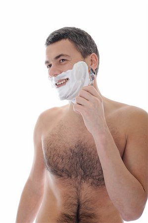 simsearch:400-04594366,k - Young handsome man shaving in the morning . isolated on white background Photographie de stock - Aubaine LD & Abonnement, Code: 400-04313895