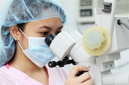 Close up of asian female researcher or doctor working in the laboratory Stock Photo - Budget Royalty-Free & Subscription, Code: 400-04324233