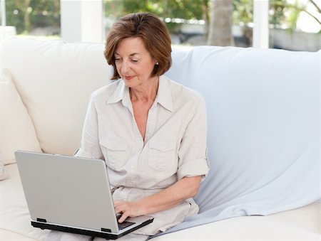 Senior working on her laptop Stock Photo - Budget Royalty-Free & Subscription, Code: 400-04324334