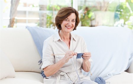 Woman knitting at home Stock Photo - Budget Royalty-Free & Subscription, Code: 400-04324348